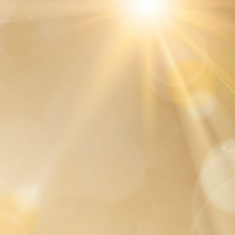 Natural light lens flare on gold background sun ray effect